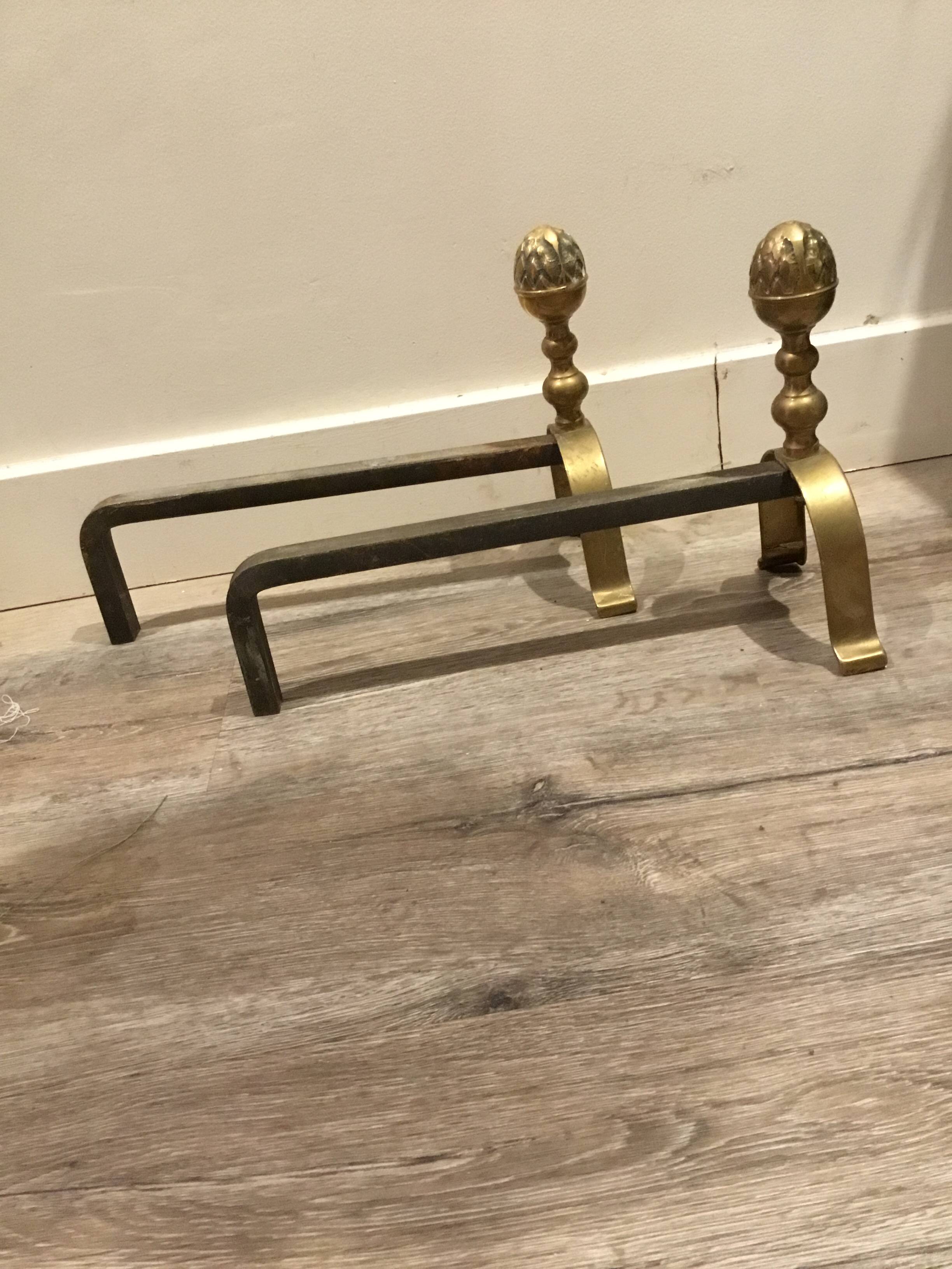 Neoclassical pine cone fireplace chenets in bronze