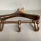 Coat rack gilded metal hanger varnished