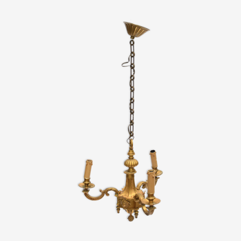 Gilded bronze chandelier decorated with mascarons of female faces