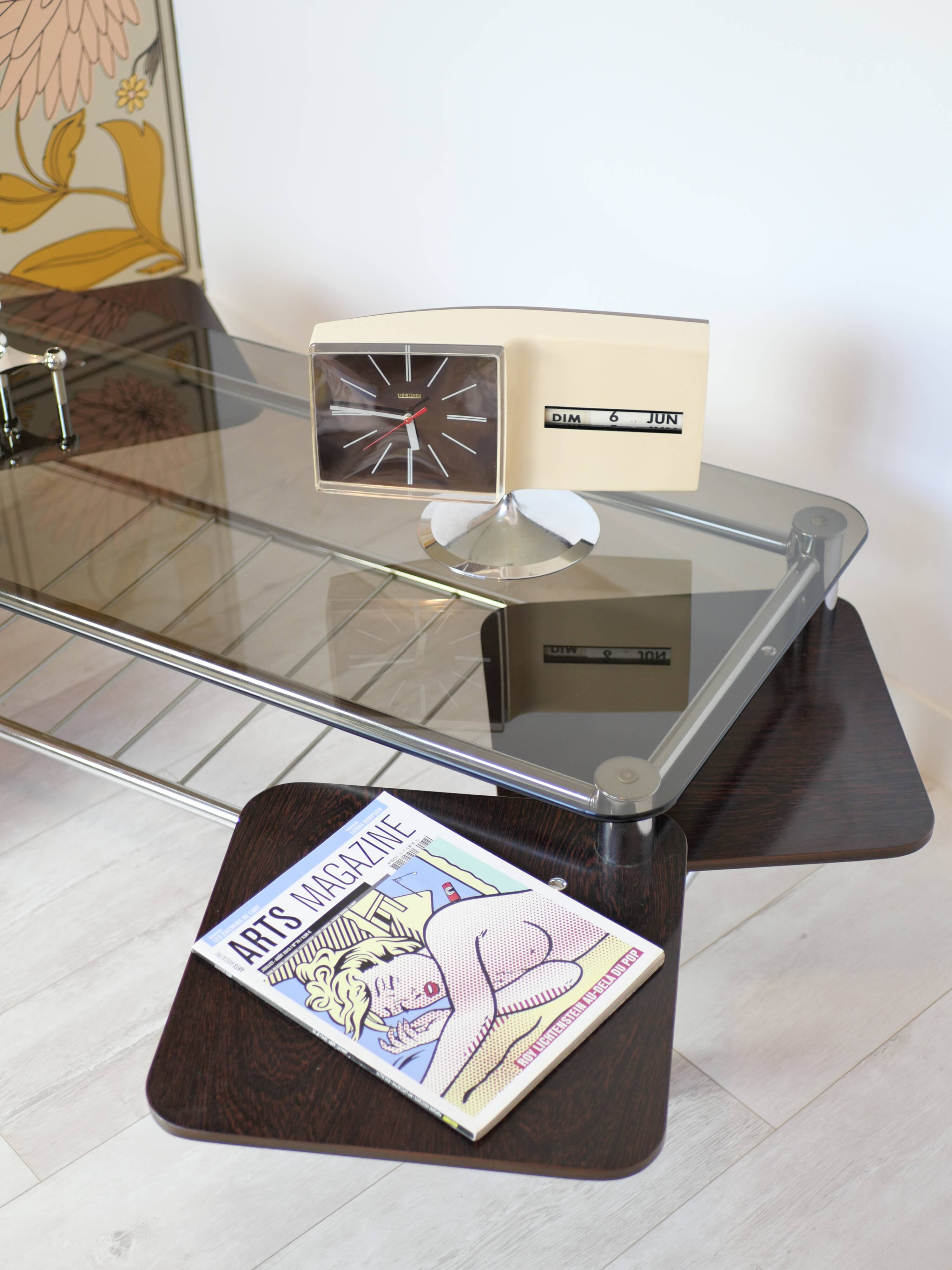 Chrome metal coffee table with smoked glass top.