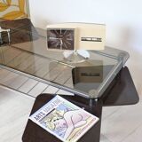 Chrome metal coffee table with smoked glass top.