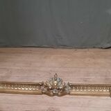 Gilt bronze hearth bar