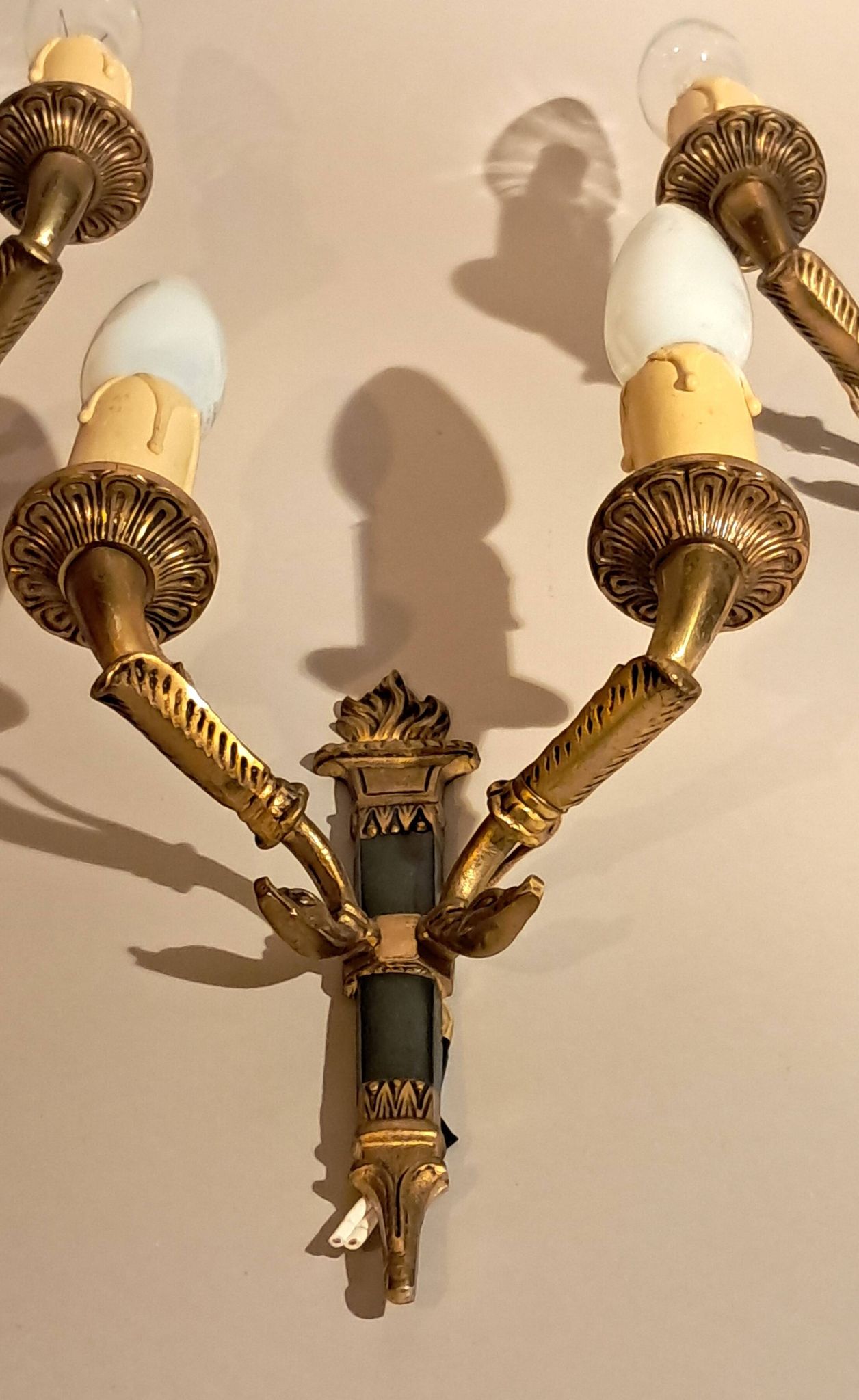 Set of 3 Empire style wall lights in bronze and gilded and green lacquered brass, Circa 1950.