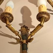 Set of 3 Empire style wall lights in bronze and gilded and green lacquered brass, Circa 1950.