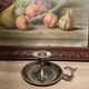 Silver metal thumb candle holder