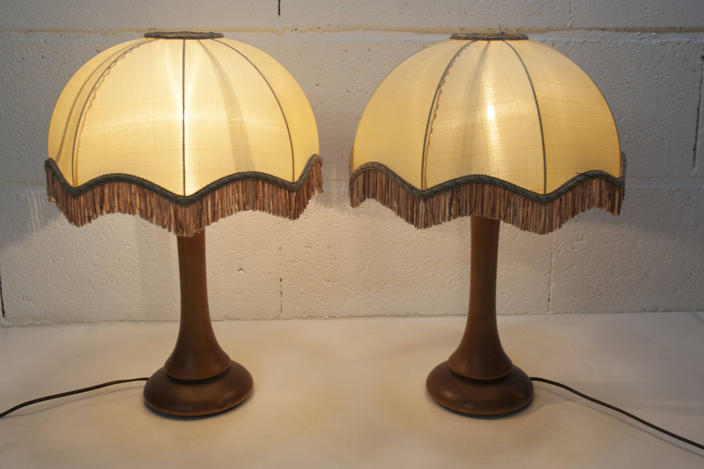 Pair of 1930s Art Deco bedside lamps with fringes, solid wood legs 52cm