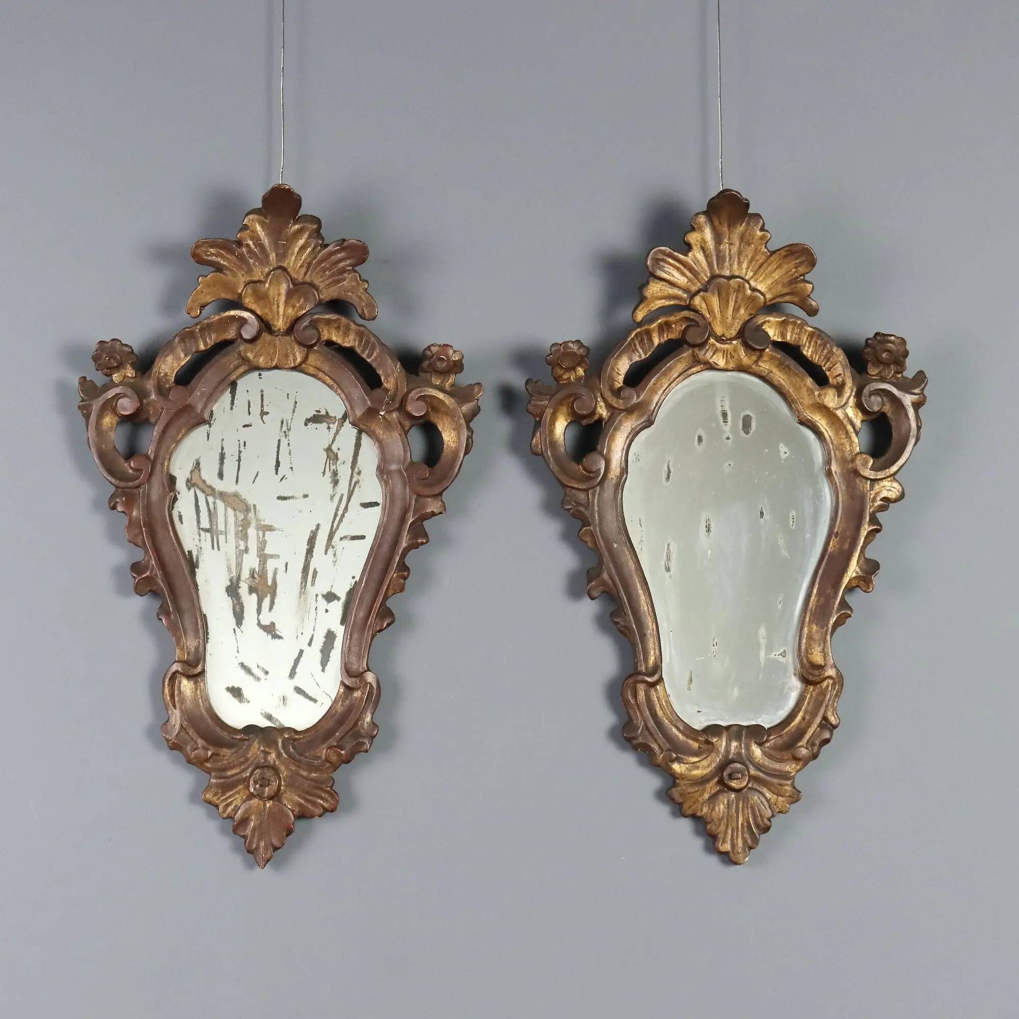 Small antique mirrors in carved and gilded wood, Italy, 20th century.