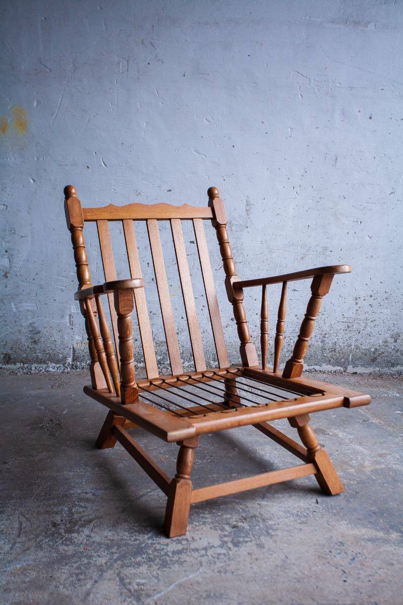 Set of 2 oak armchairs in mid-century style, covered in a blue-green checked fabric.
