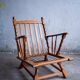 Set of 2 oak armchairs in mid-century style, covered in a blue-green checked fabric.