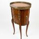 Oval bedside table in Louis XV style with marquetry.