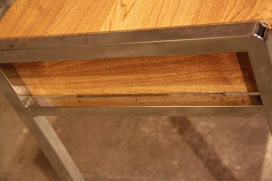 Small dressing table with chrome legs and oak laminate.