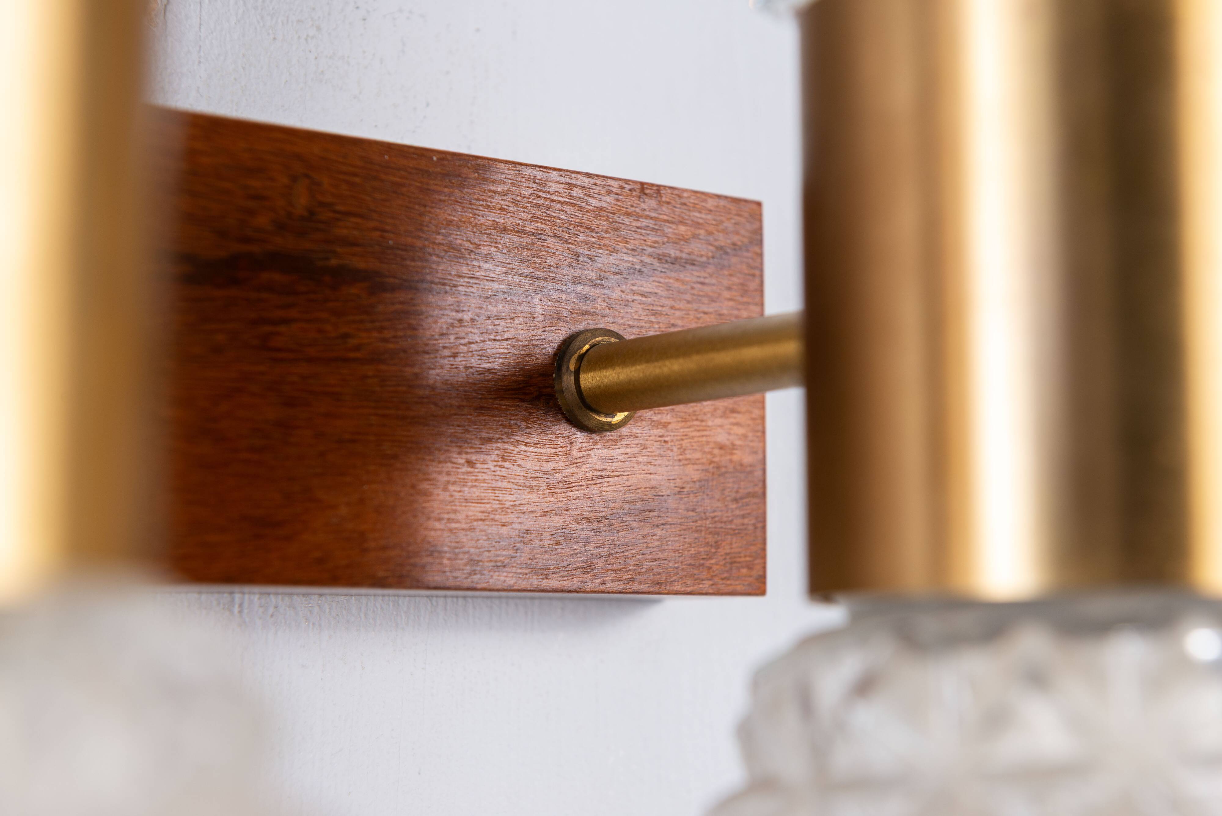 Pair of Swedish wall lamps with teak wood, brass and glass cup shade