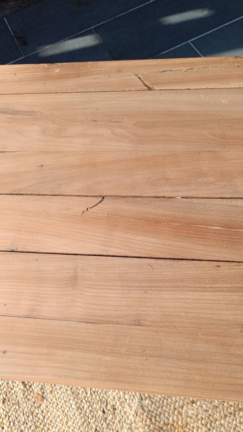 Low farmhouse table in raw wood