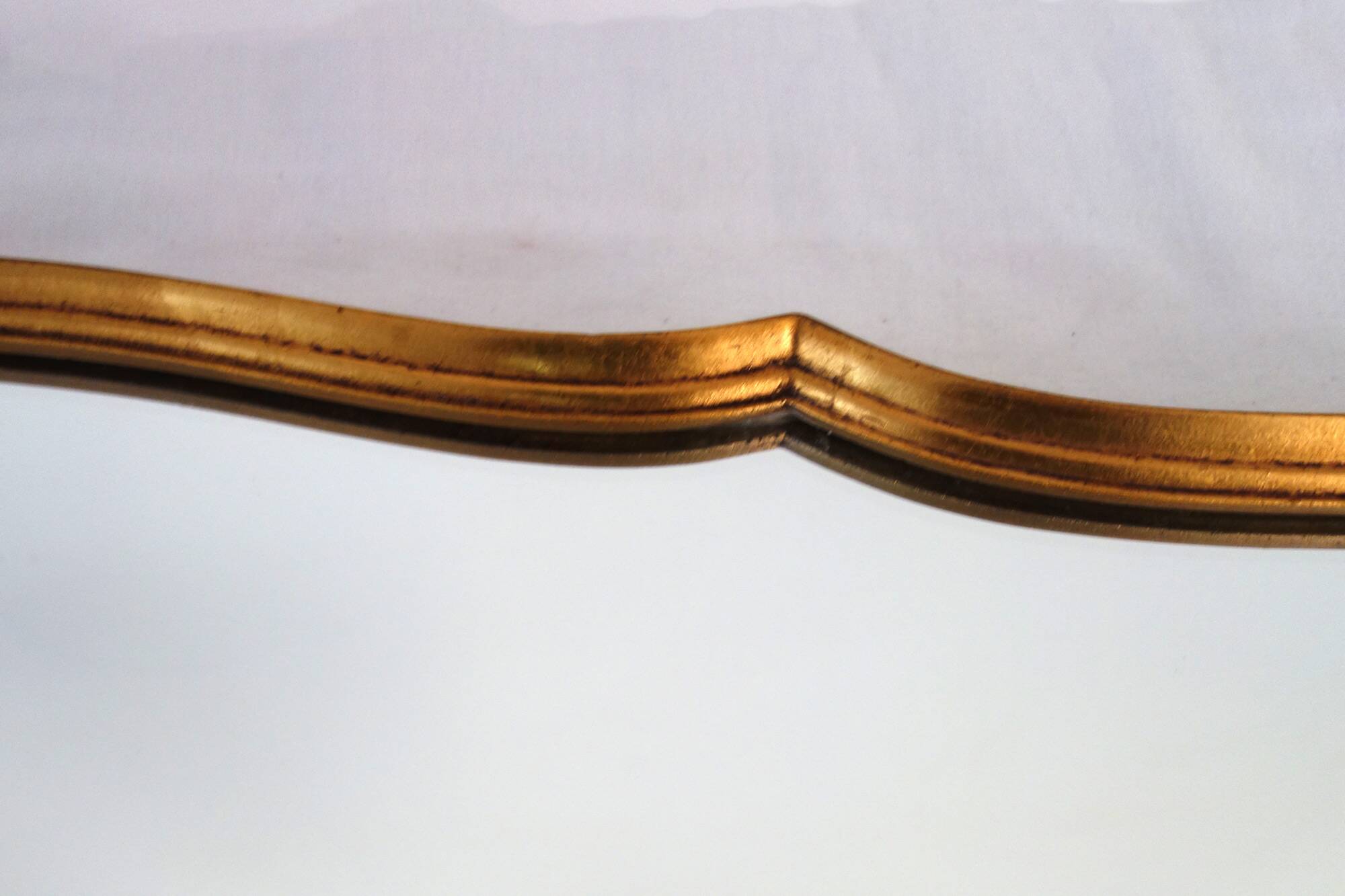 Vintage rocaille or shell gold mirror