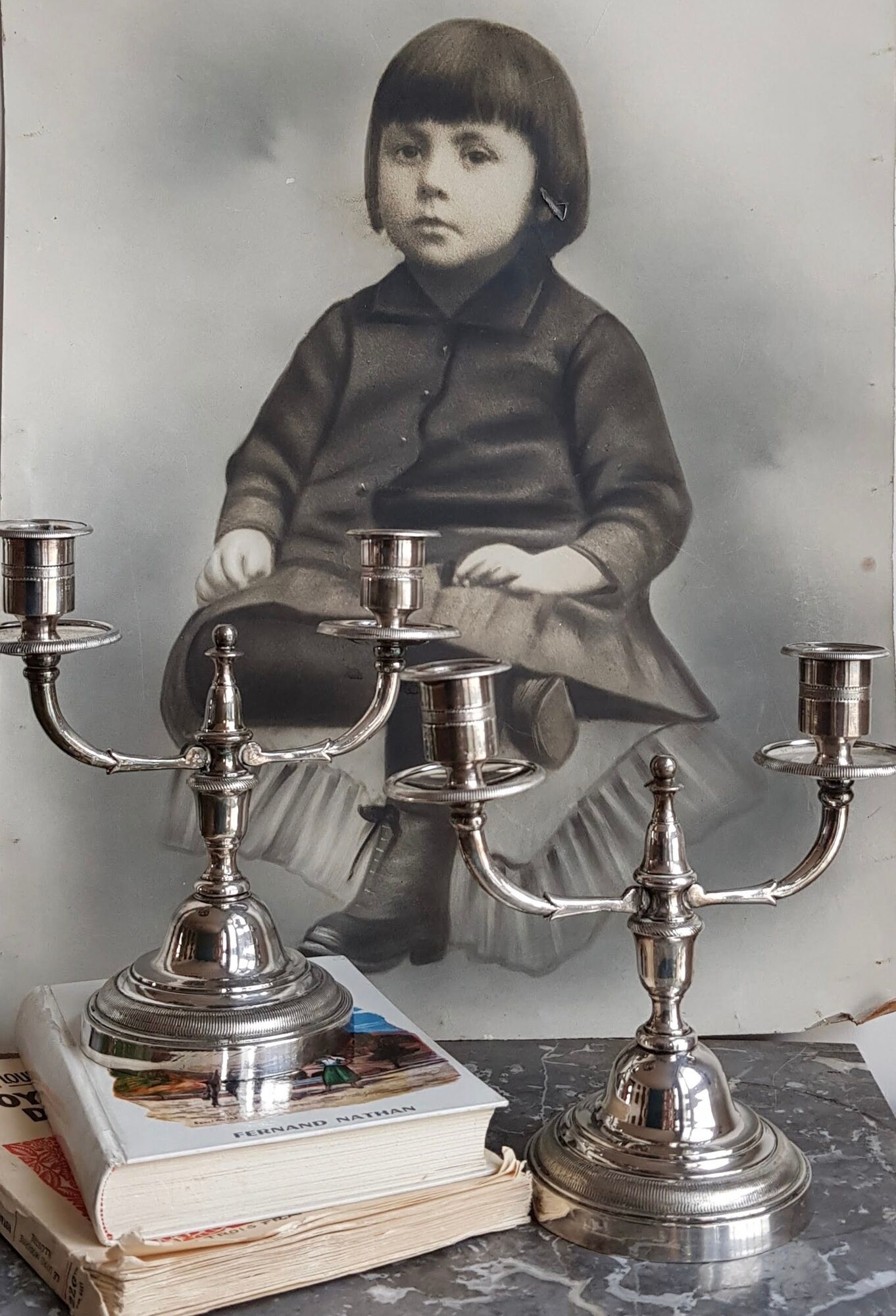 Pair of old silver metal candlesticks