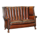 Victorian leather canapé and armchair, barrel back, circa 1860, restored.
