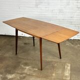 Extendable vintage dining table in teak wood