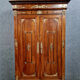 Louis Philippe period wardrobe (nineteenth) entirely covered with gilded bronzes