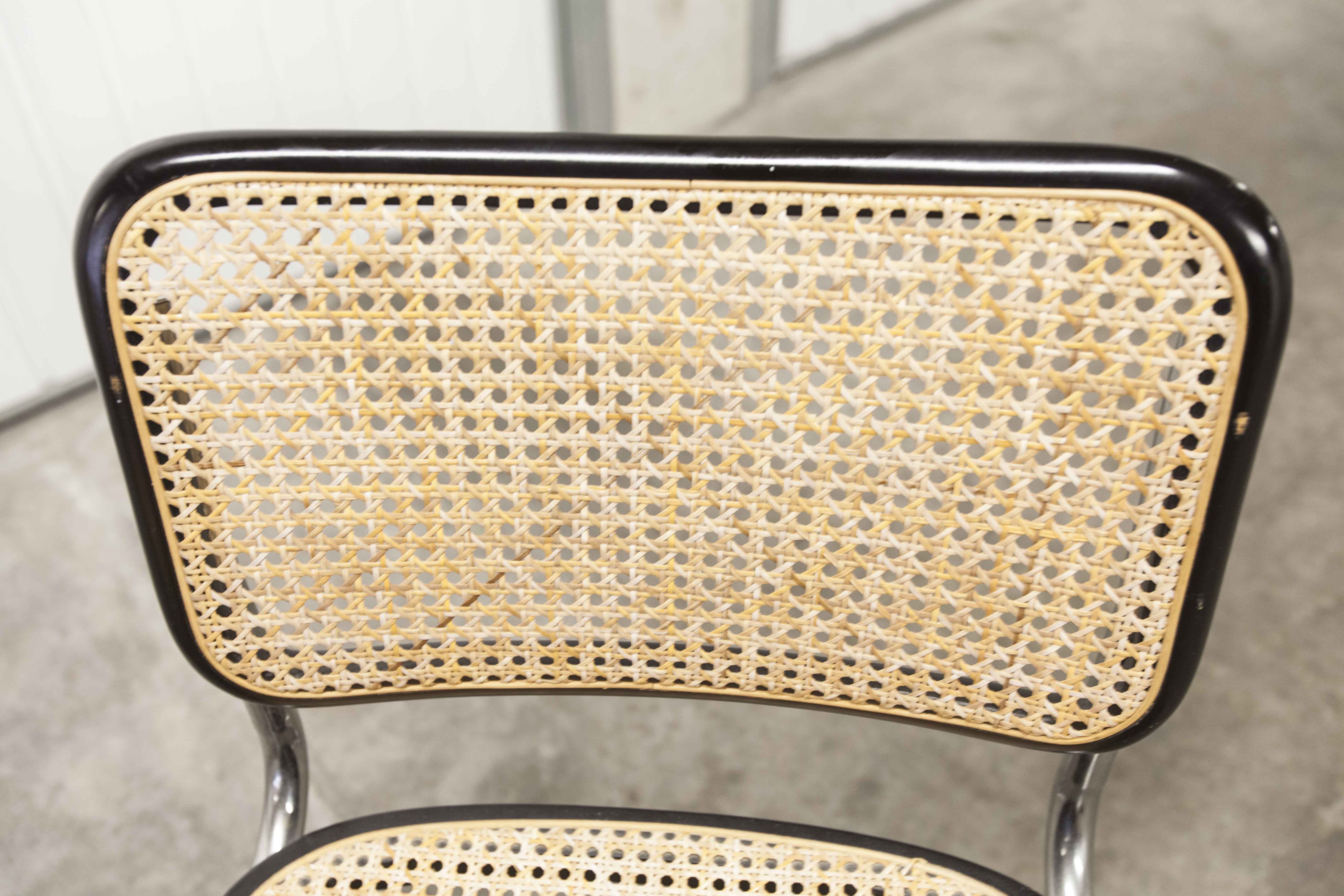 Pair of black Breuer b32 chairs and cannage