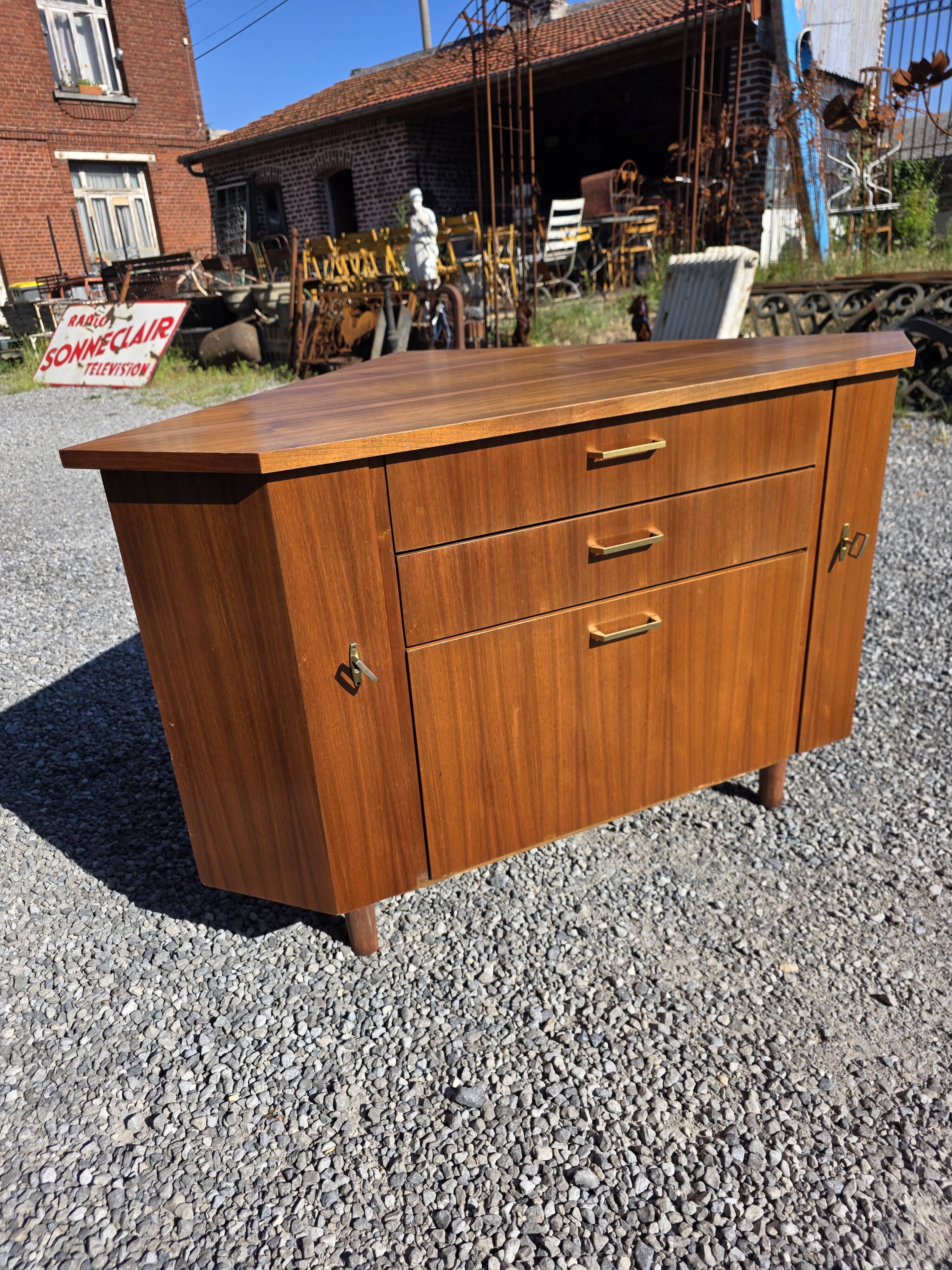 Scandinavian corner unit in teak from the 1960s.