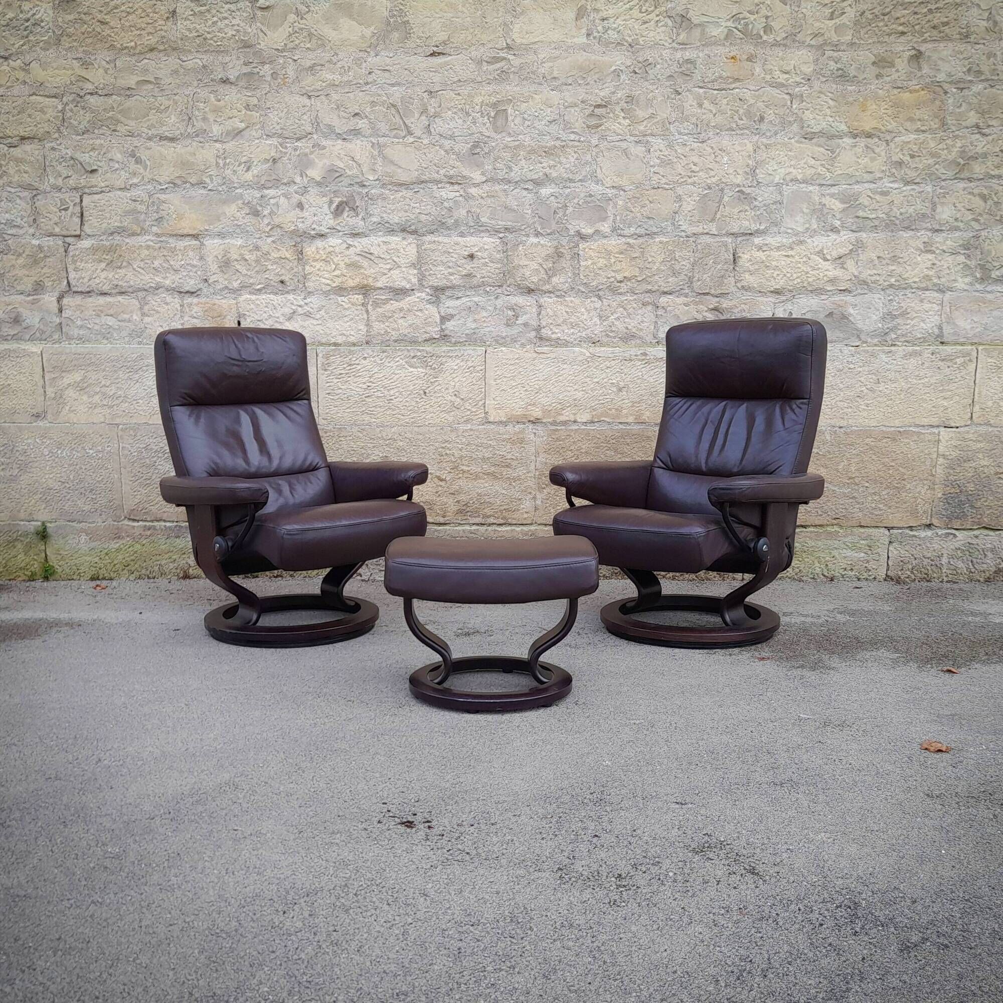 Pair of Scandinavian leather armchairs and ottoman, Ekornes, Norway, 1970