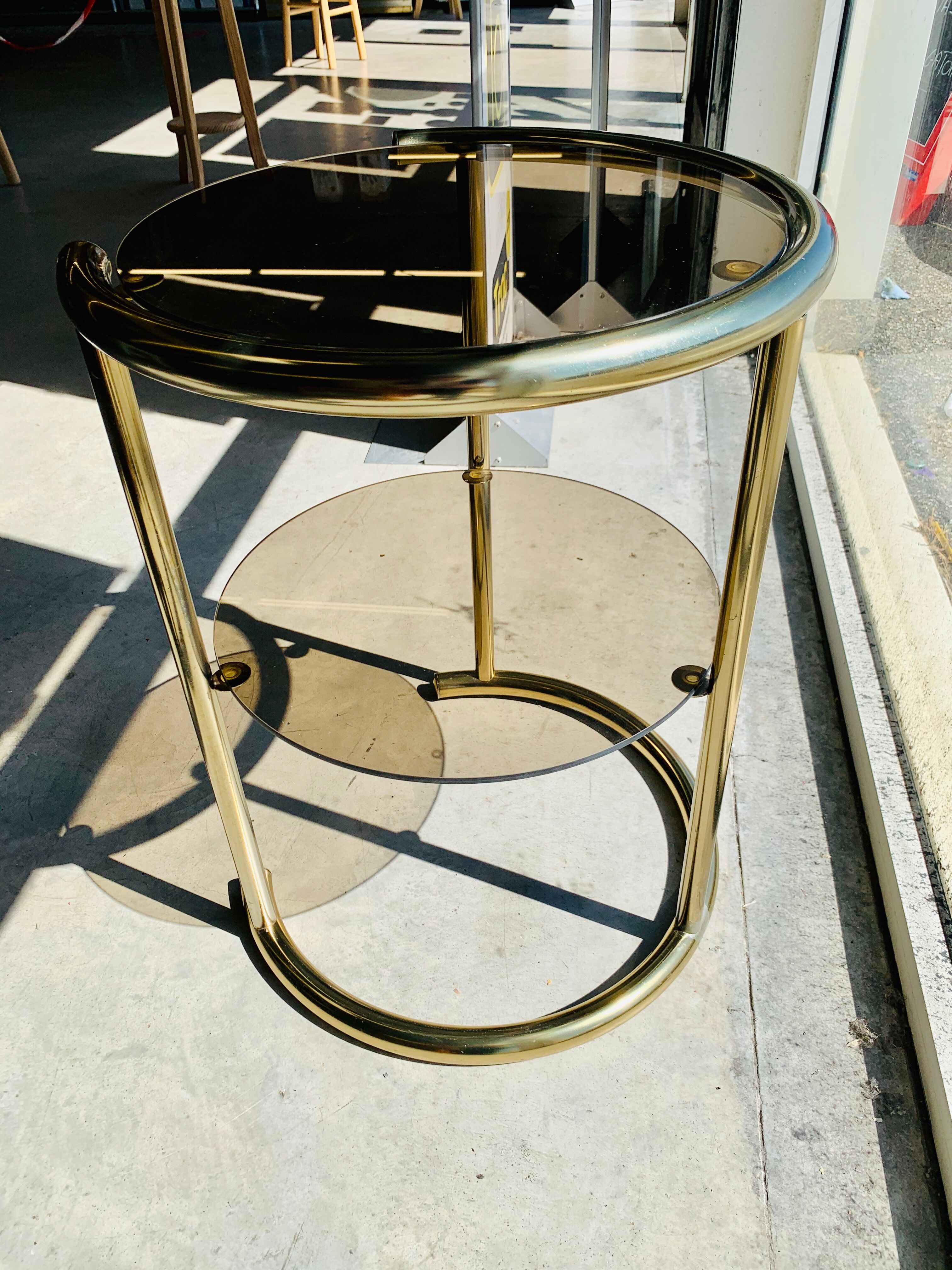 Glass and brass side table