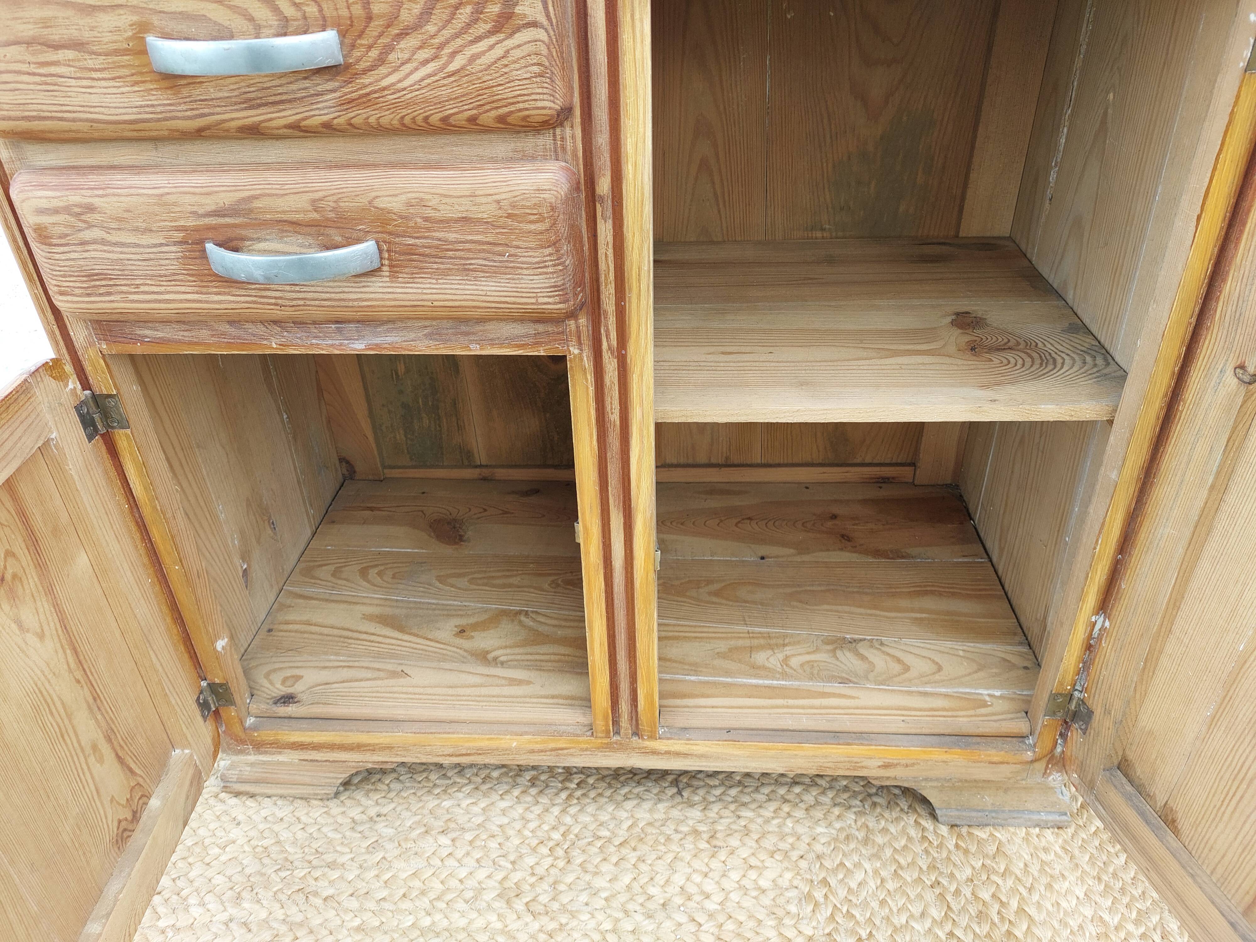 Vintage wooden buffet with a marble top.