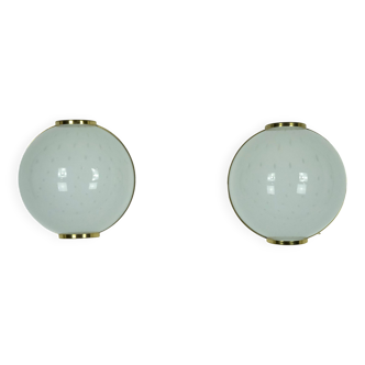 Pair of large round murano bullicante glass sconces with brass. Italy 1970s