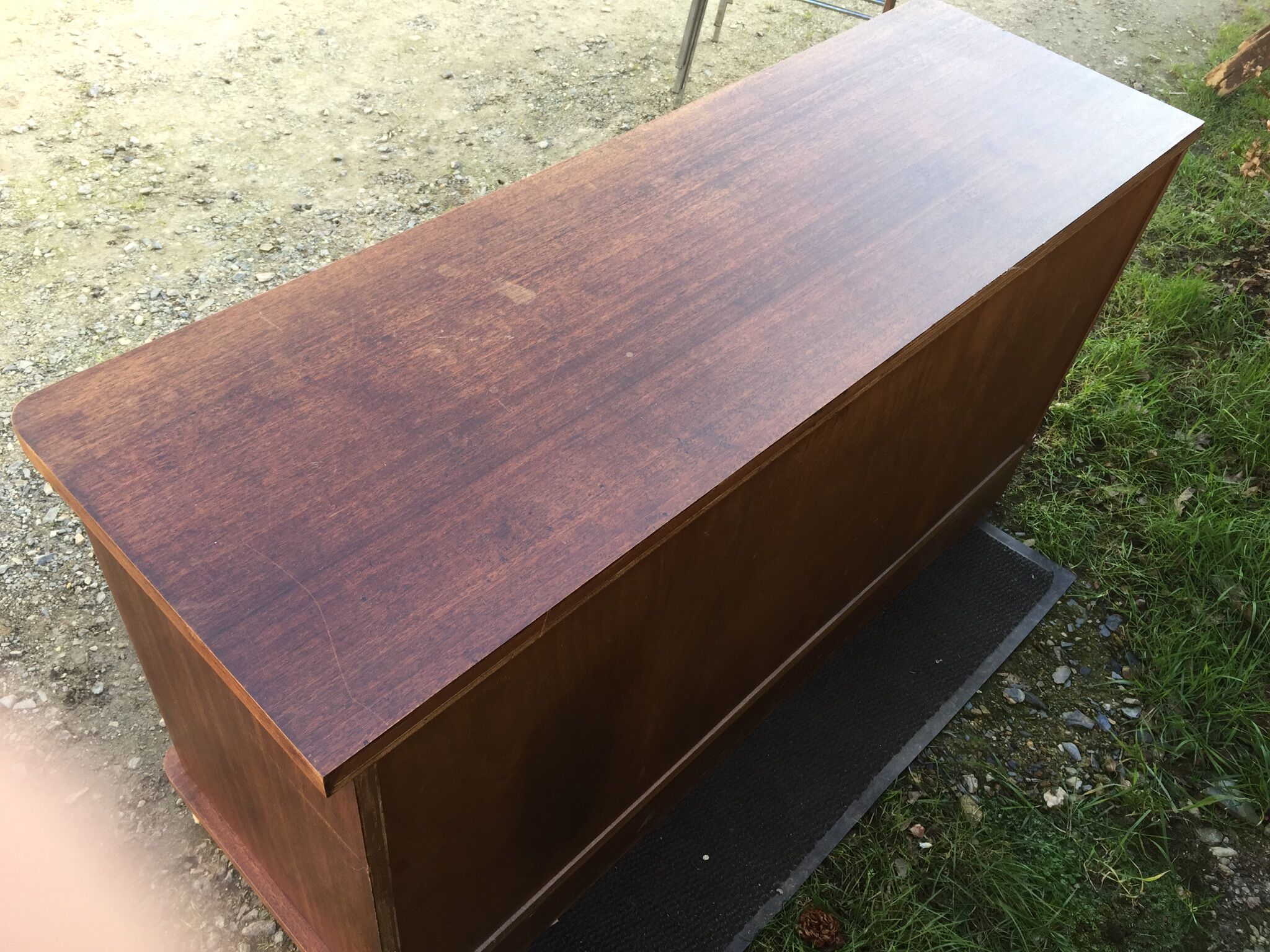 Low sideboard with sliding doors in waxed mahogany