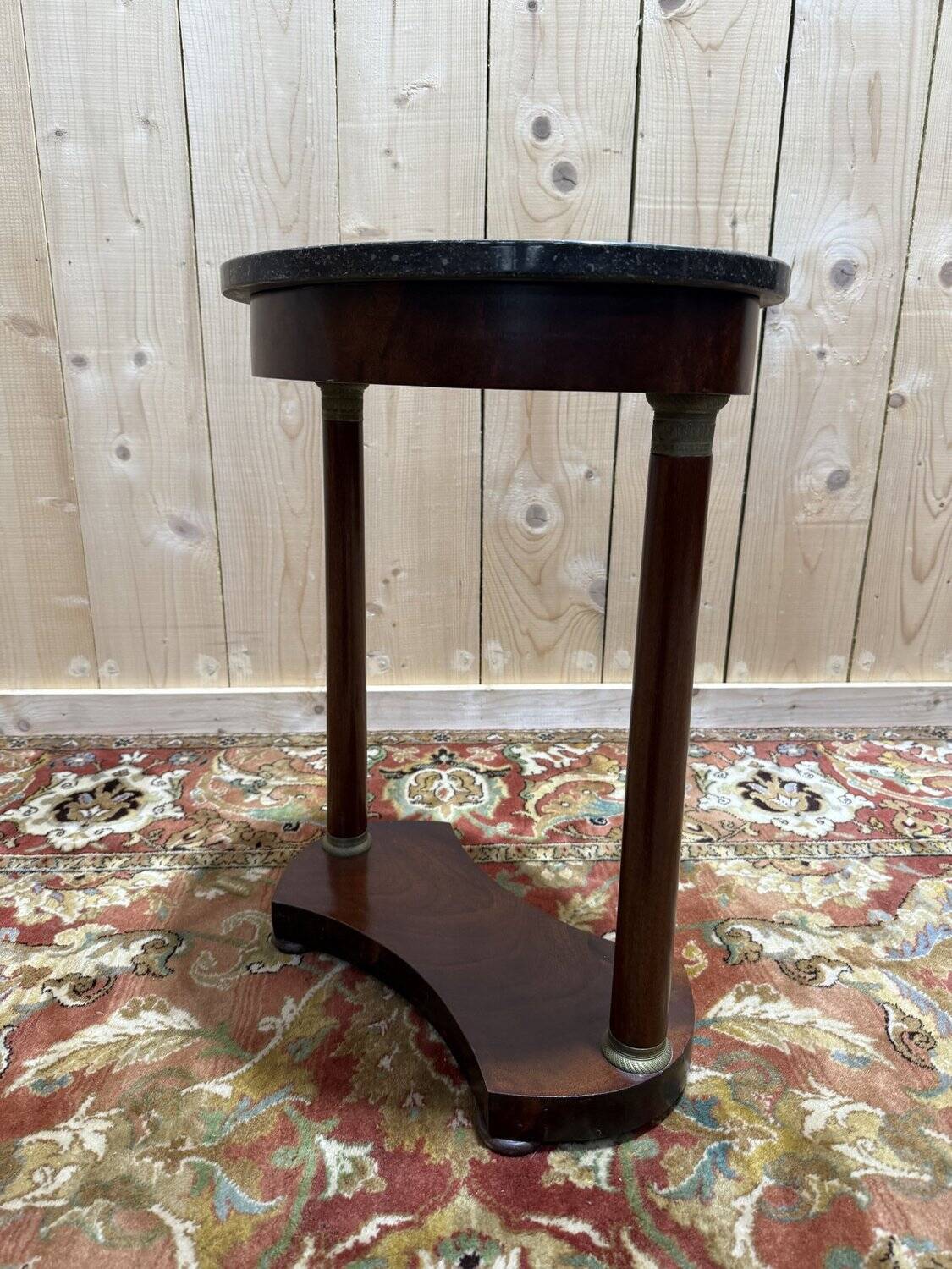 Small oval side table in Empire style