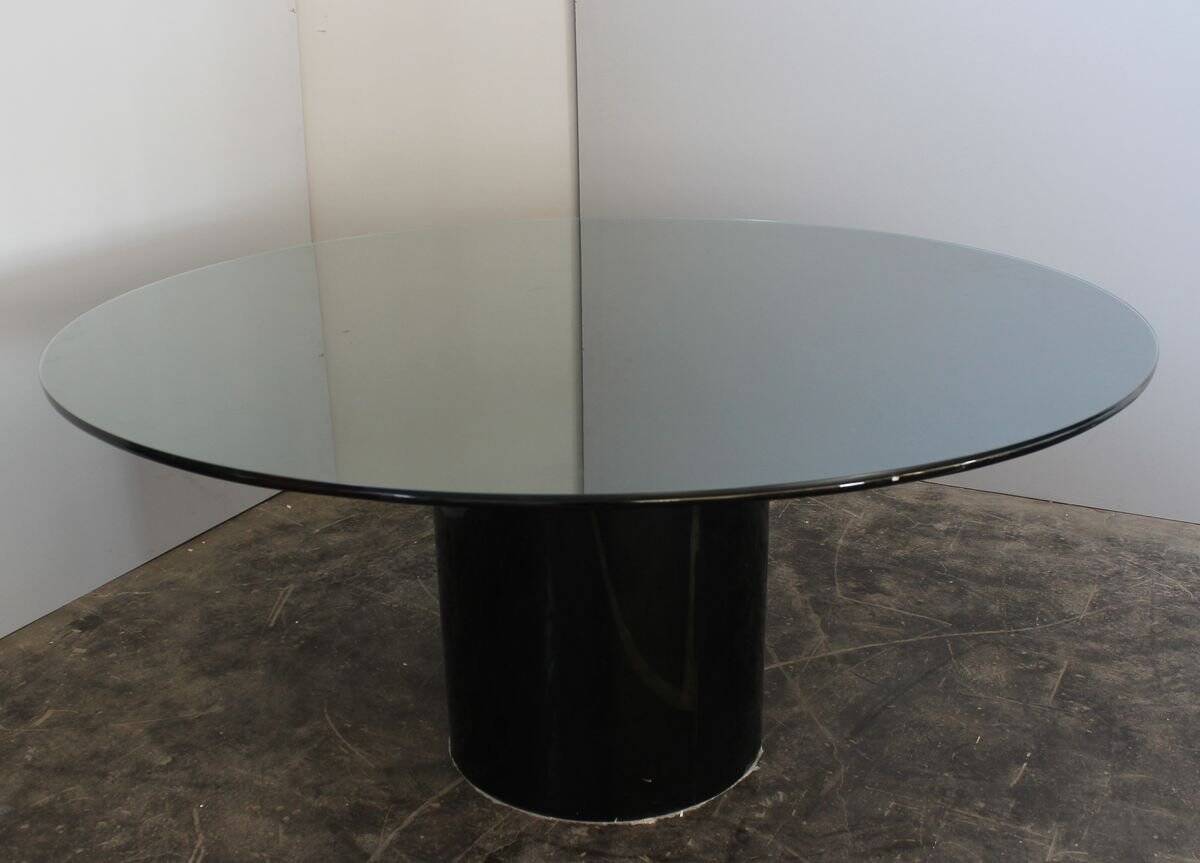 Black lacquered glass table and glass in the hoof style, Italy.