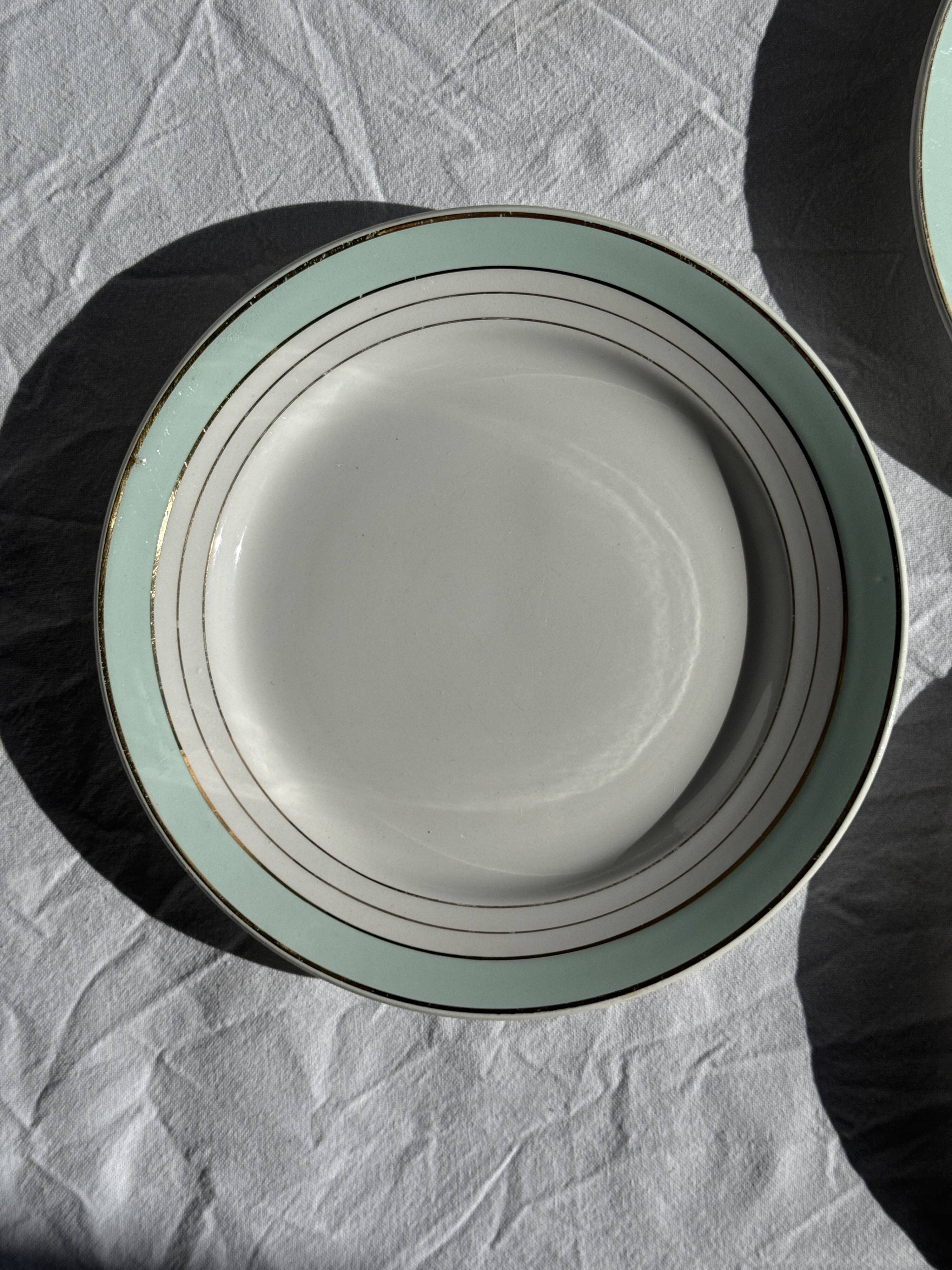 Set of 7 antique flat plates in turquoise earthenware with a gold rim D22