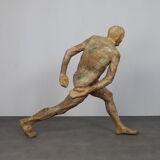 Life-size sculpture “Running Figure” by Karol Broniatowski, 1972