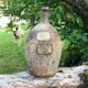 Old terracotta bottle