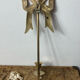 Solid brass bow and ribbon wall candle holder