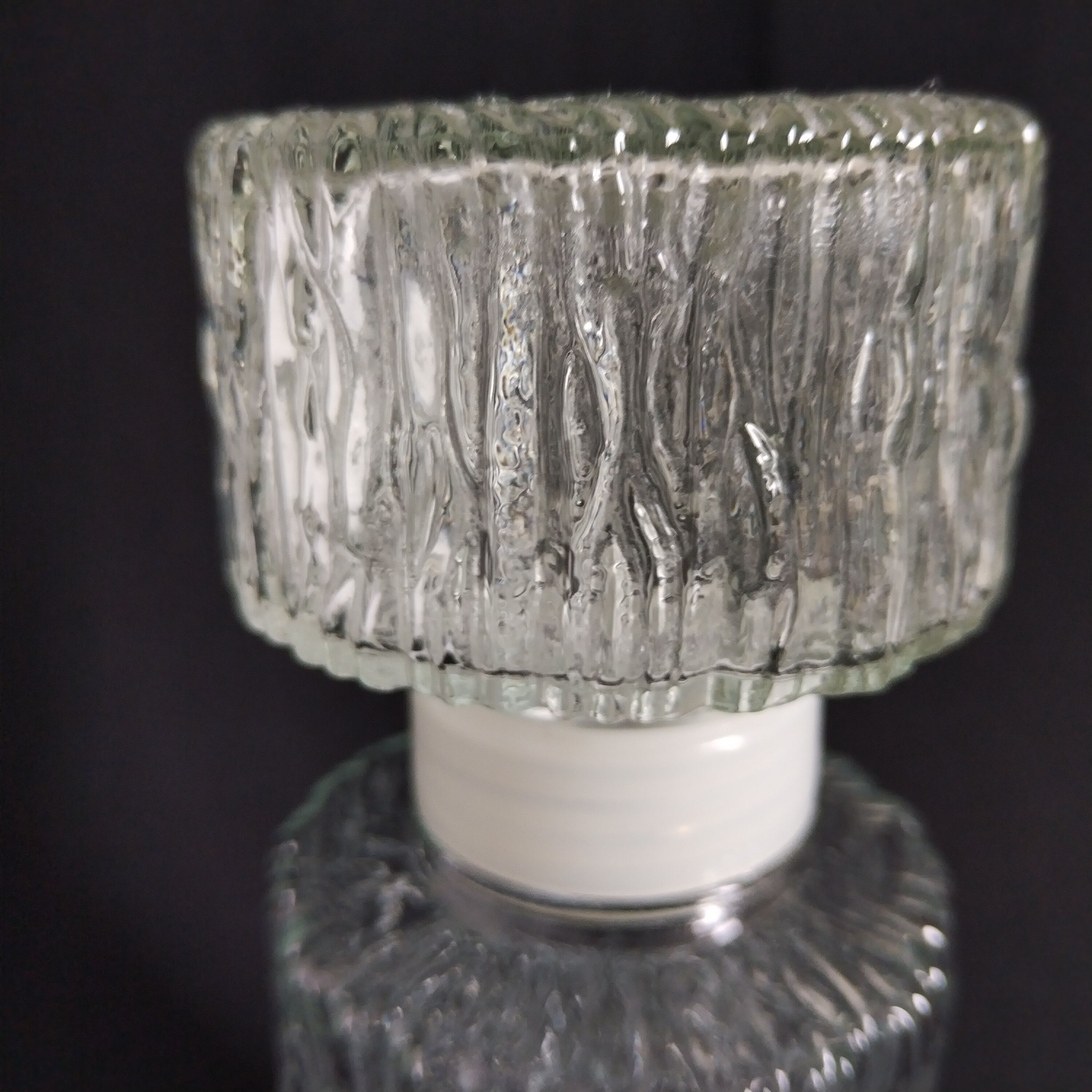 Transparent vintage carafe in pressed glass and its hermetic cap 70's