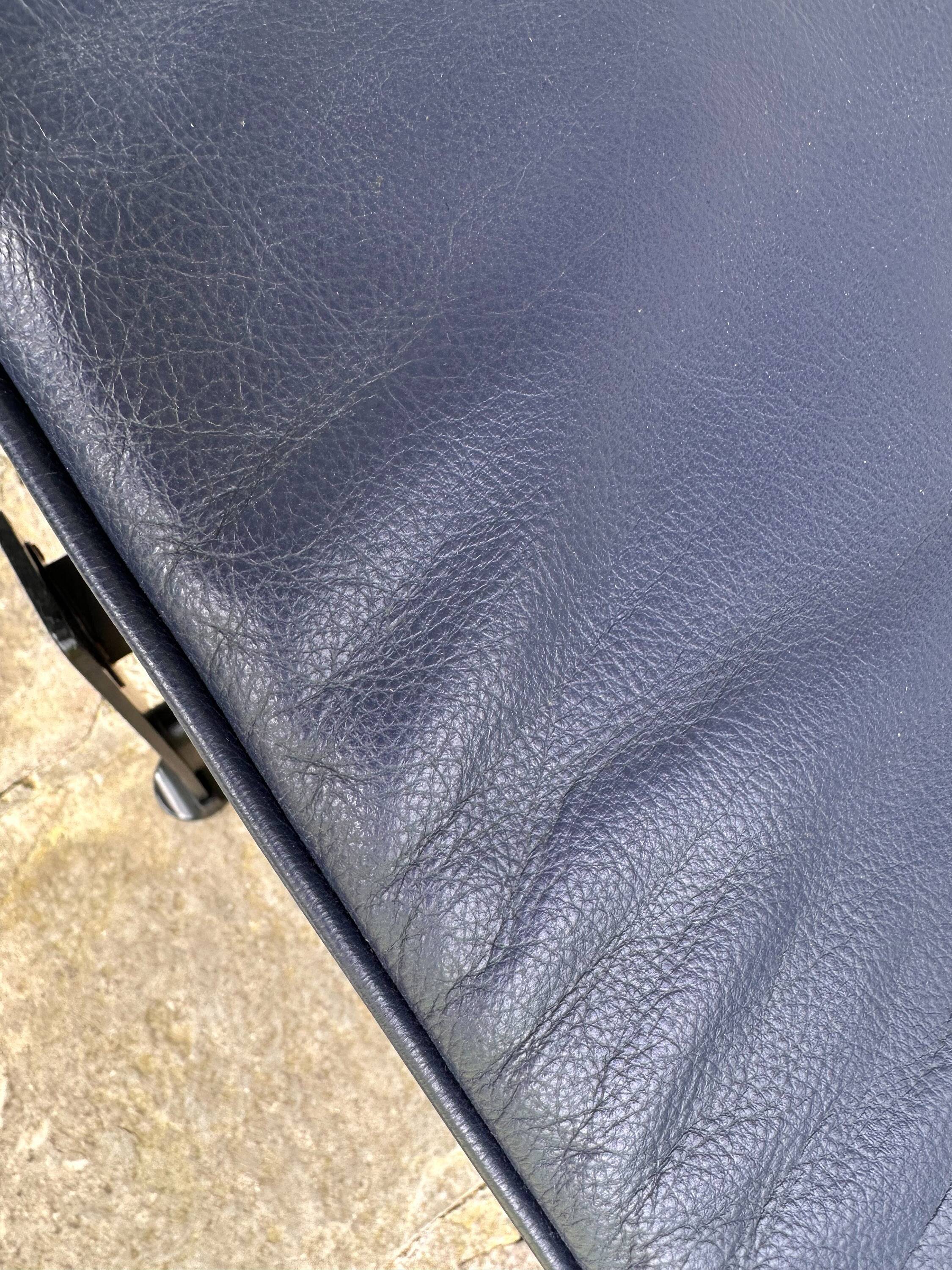 Cassina LC4 chaise longue by Le Corbusier, Pierre Jeanneret & Charlotte Perriand in blue leather.