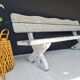 Exterior bench in patinated white solid wood