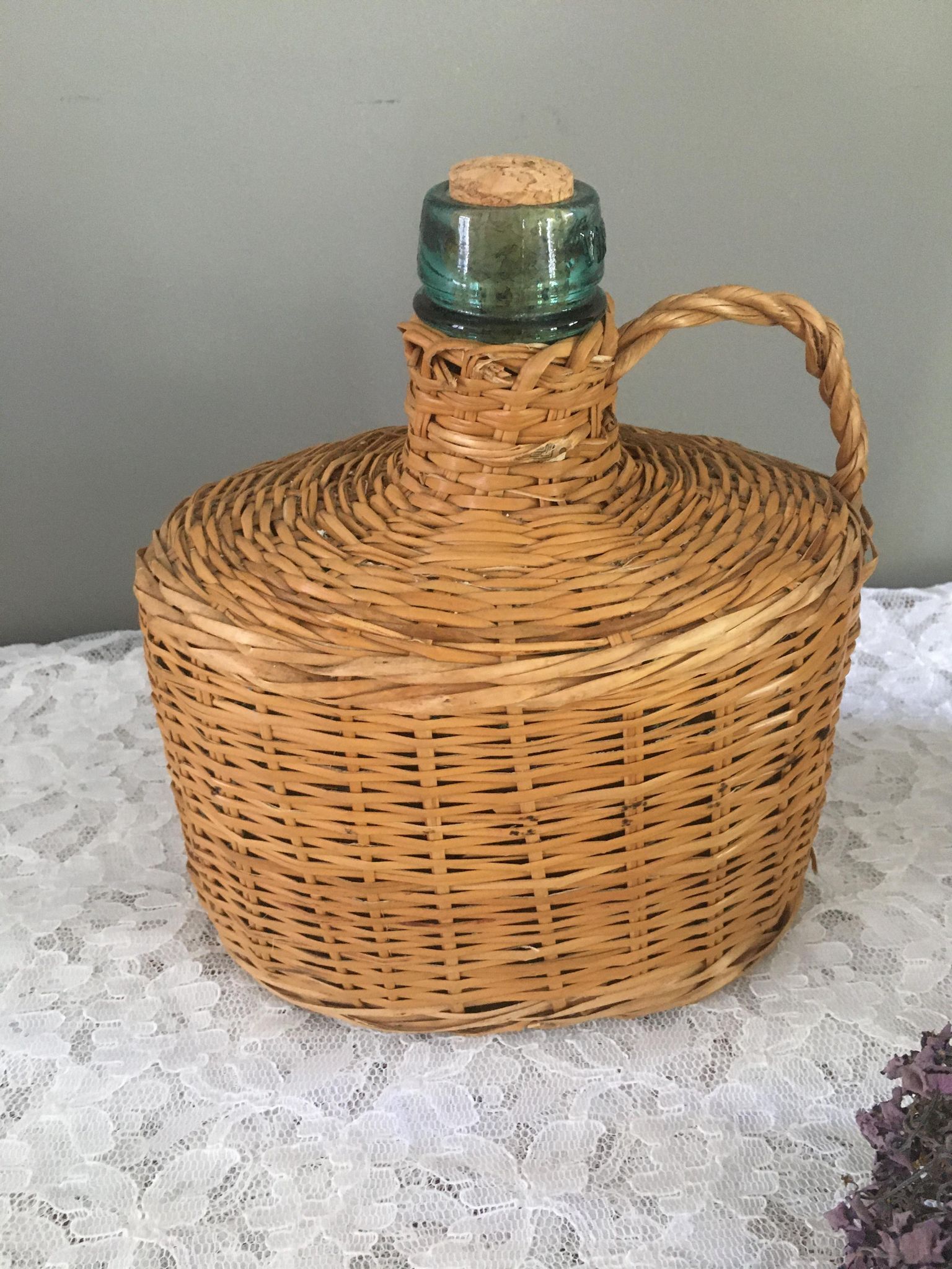 Vintage Dame-Jeanne duo and their rattan/wicker dresses