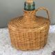 Vintage Dame-Jeanne duo and their rattan/wicker dresses