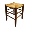 Straw stool and rustic wood