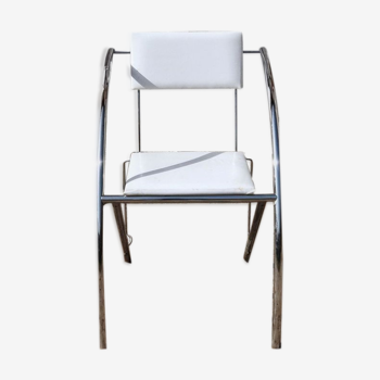 Chrome chair and white skai