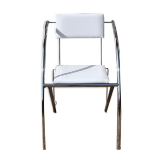 Chrome chair and white skai