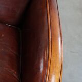 Subtle sheep leather armchair with a beautiful finish and a good patina