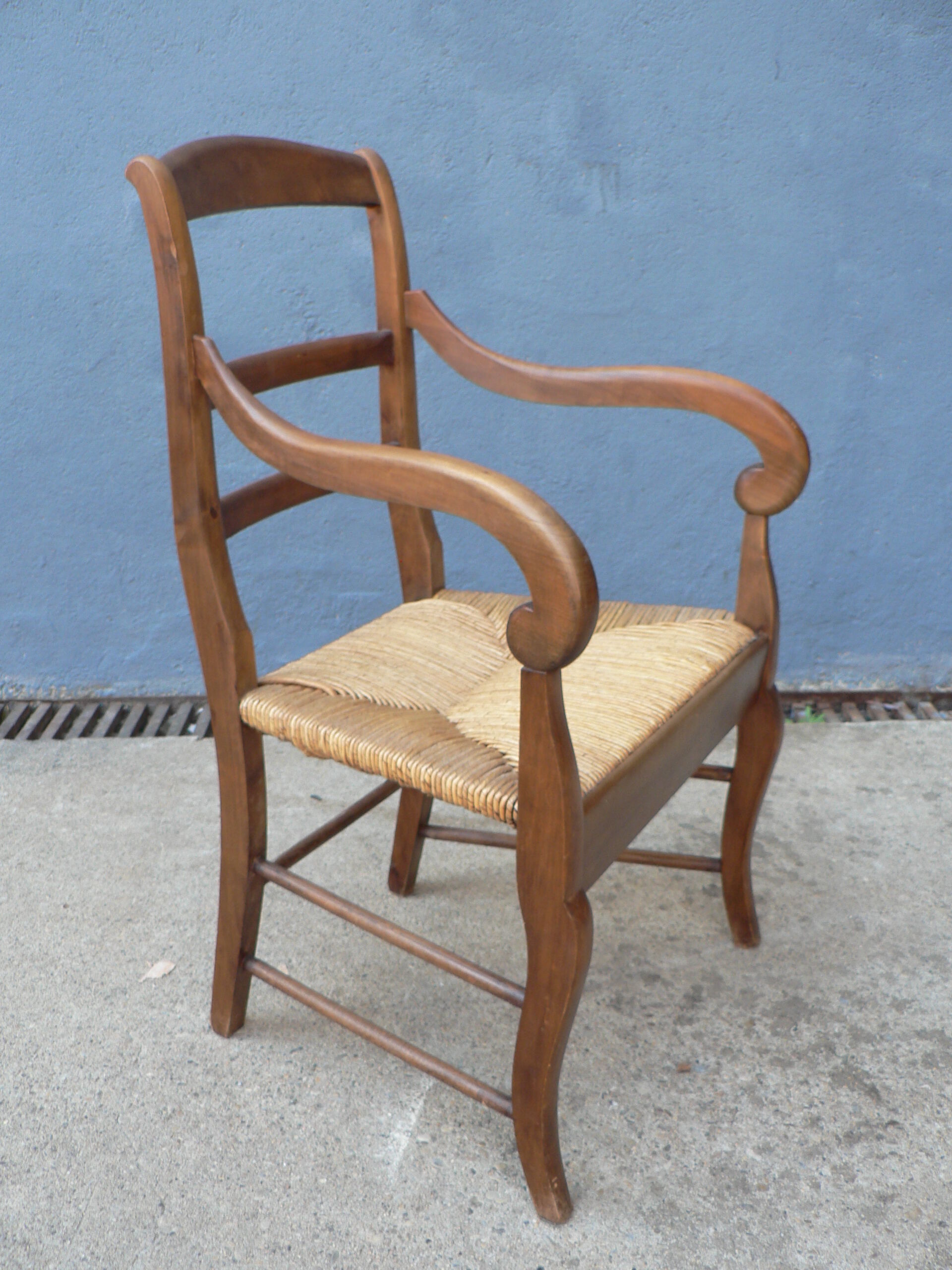 Straw provencal armchair
