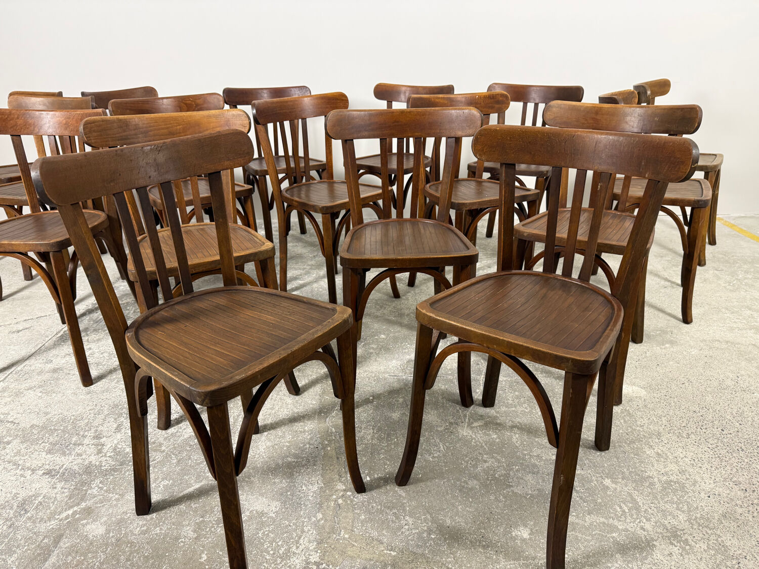 Set of 17 vintage bistro chairs in curved wood — striped seat, be
