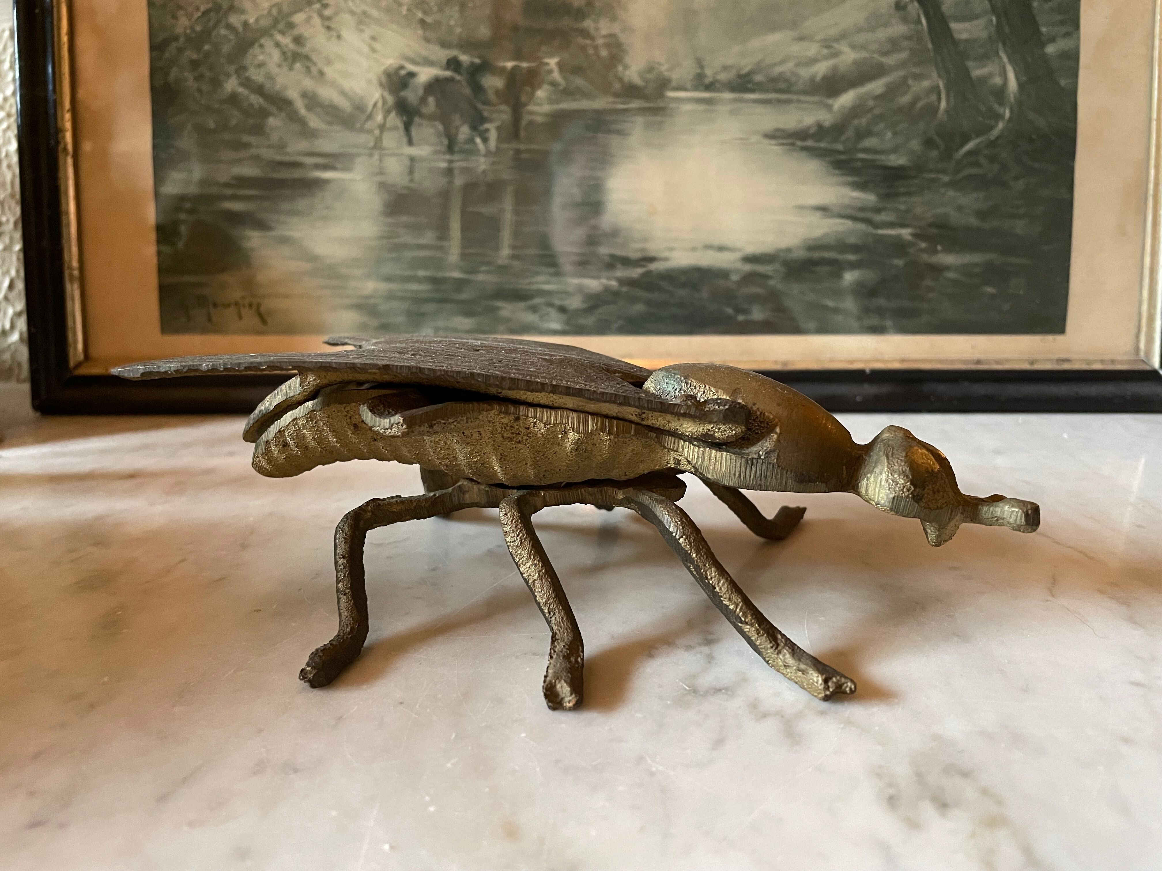 Golden metal insect ashtray