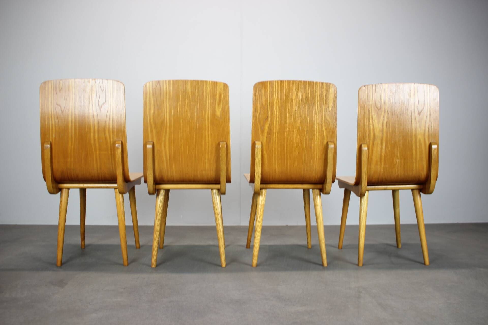 Set of 4 vintage wooden dining chairs in mid-century modern style, Europe, 1970s.