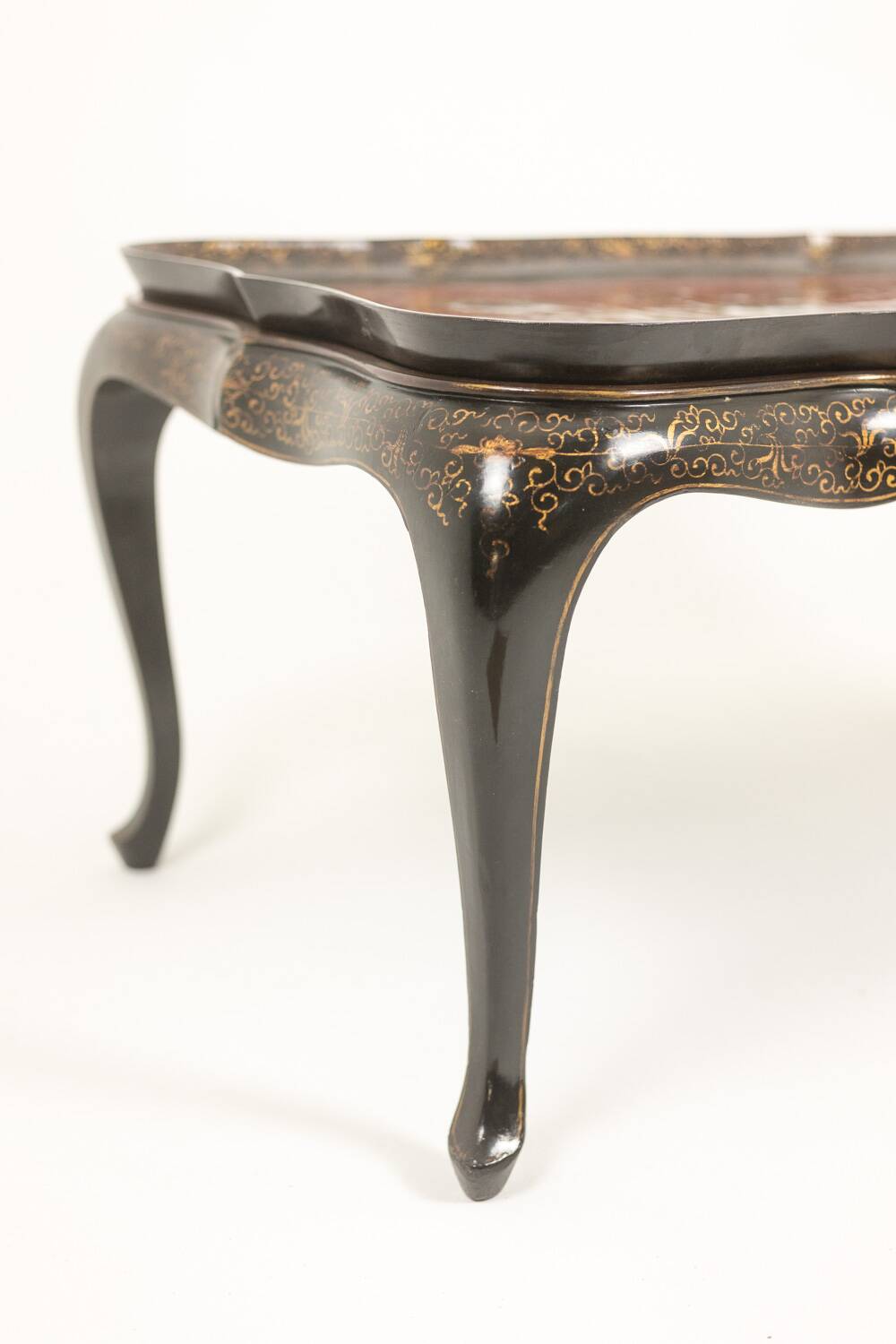 Coffee table with removable top in red and black lacquered wood. 1950s.