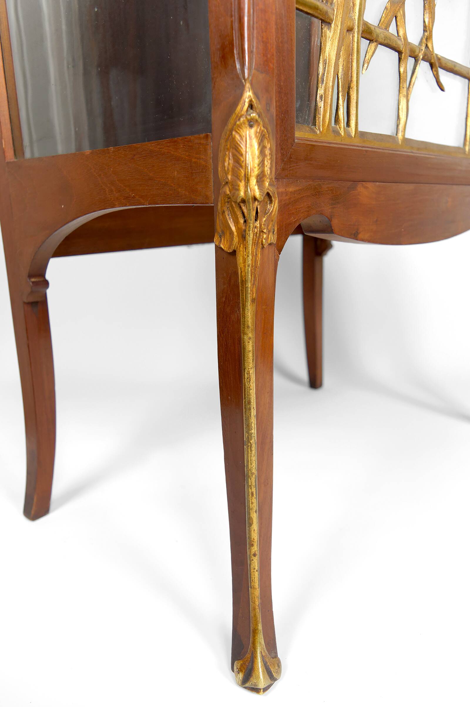 Art Nouveau display case, bronzes and carved wood on a floral theme, circa 1900